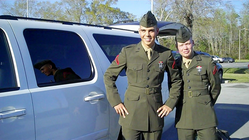 2 military men in dress uniforms